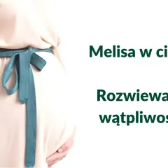 Brzuch kobiety w ciąży, podkreślony turkusową szarfą. Tekst: "Melisa w ciąży? Rozwiewamy wątpliwości!".