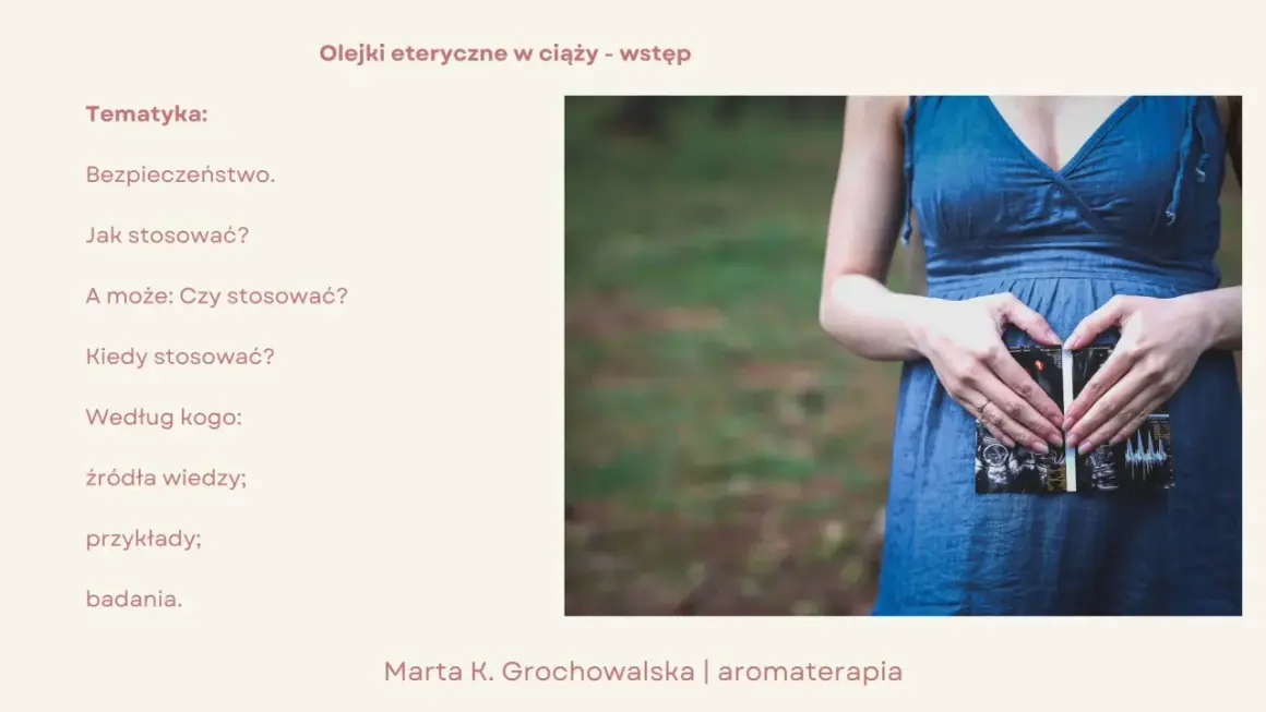 Kobieta w ciąży trzyma USG, tworząc serce dłońmi. Temat: olejki eteryczne w ciąży – bezpieczeństwo, stosowanie i źródła wiedzy.